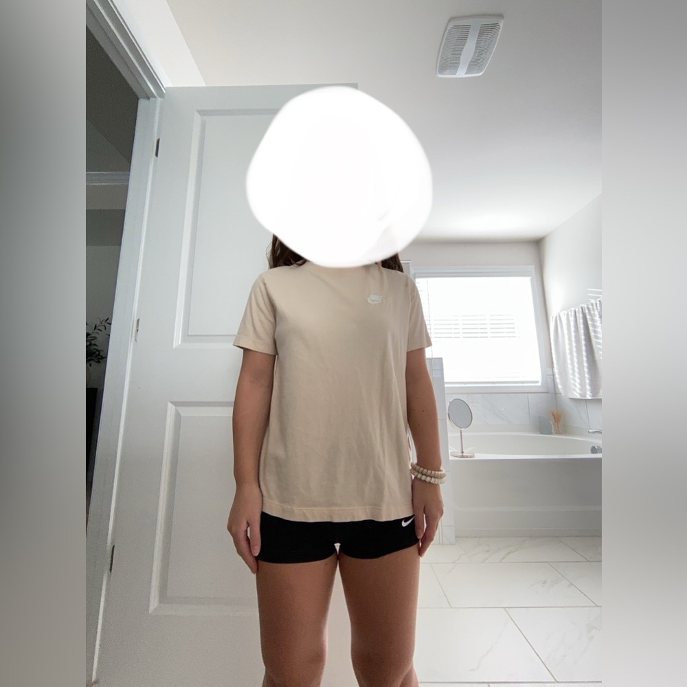 A Nike cream color T-Shirt